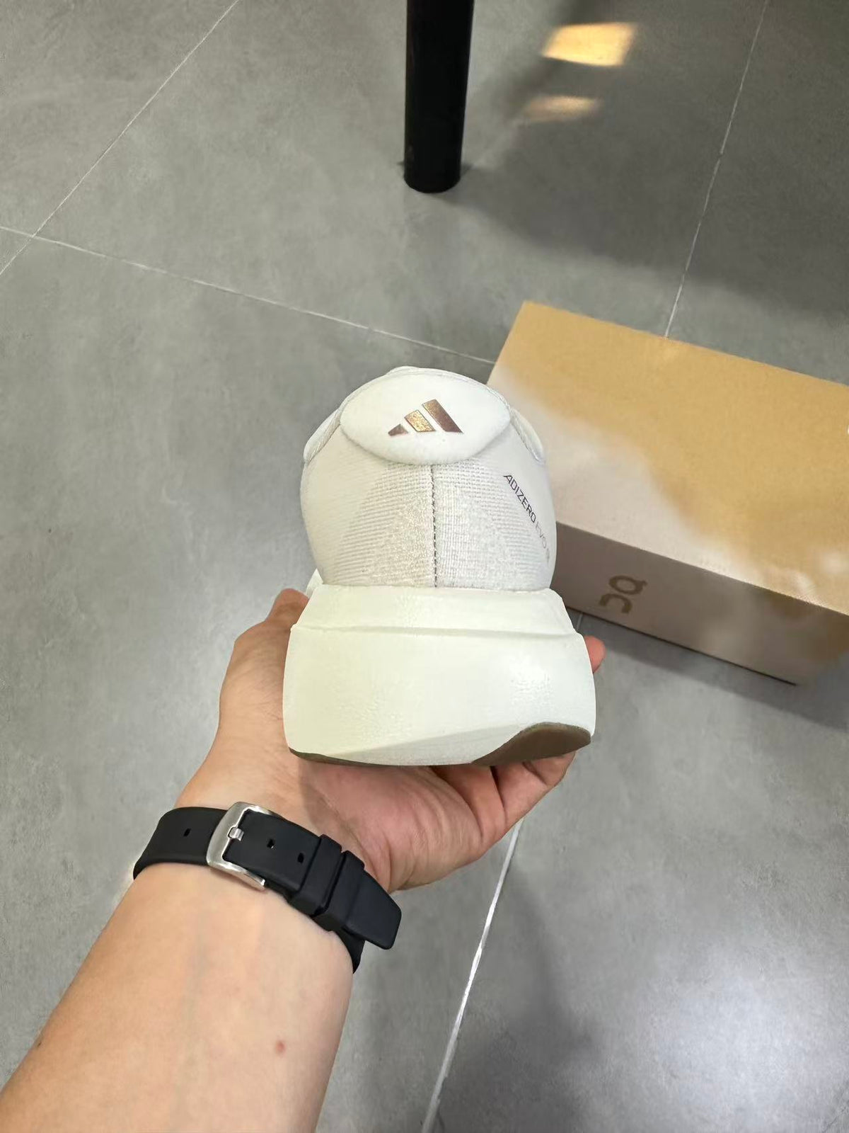 Adidas Adizero Lightstrike Pro White Champagne Shoes for Running - product image from the listing.