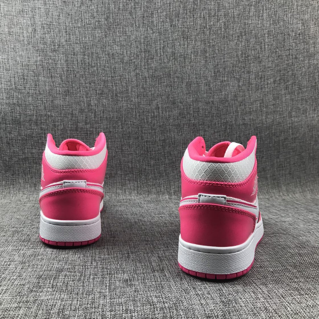 Air Jordan 1 Mid Sneakers in White Pink 555112-611 - product image from the listing.