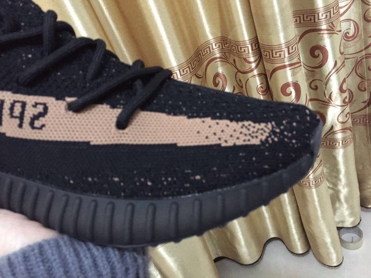 Black and Beige Yeezy 350 V2 Knit Sneakers - product image from the listing.