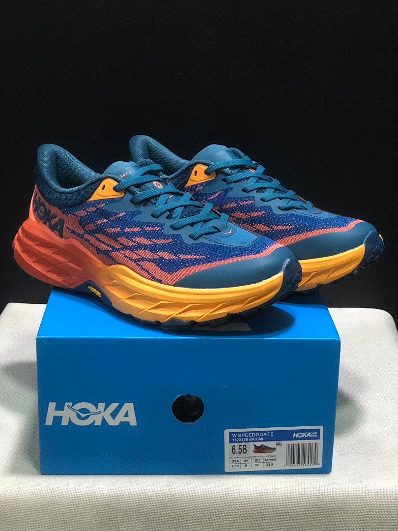 HOKA Speedgoat 5 Trail Running Shoes, in Blue and Orange - product image from the listing.