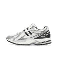 White and Black New Balance M1906RER Sneakers - product image from the listing.