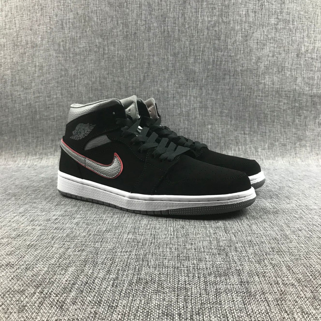 Air Jordan 1 Mid Sneakers in Black Grey Red 554724-060 - product image from the listing.