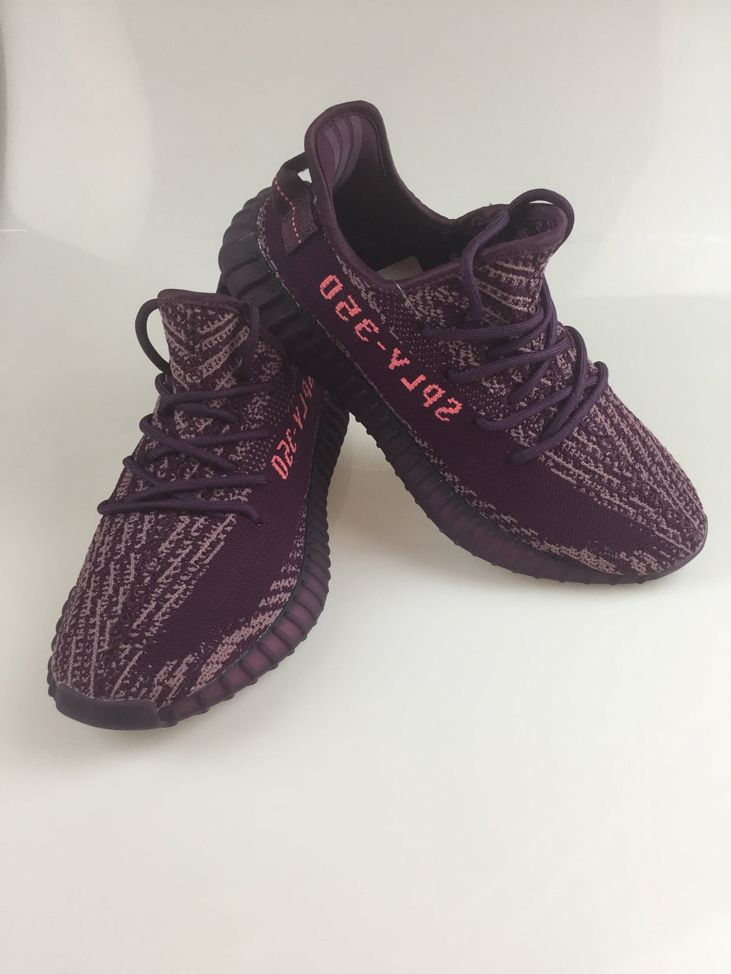Black and Beige Yeezy 350 V2 Knit Sneakers - product image from the listing.