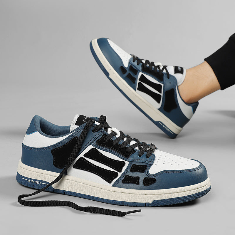 AMIRI Low-Top Sneakers in Navy, in White and Black - product image from the listing.