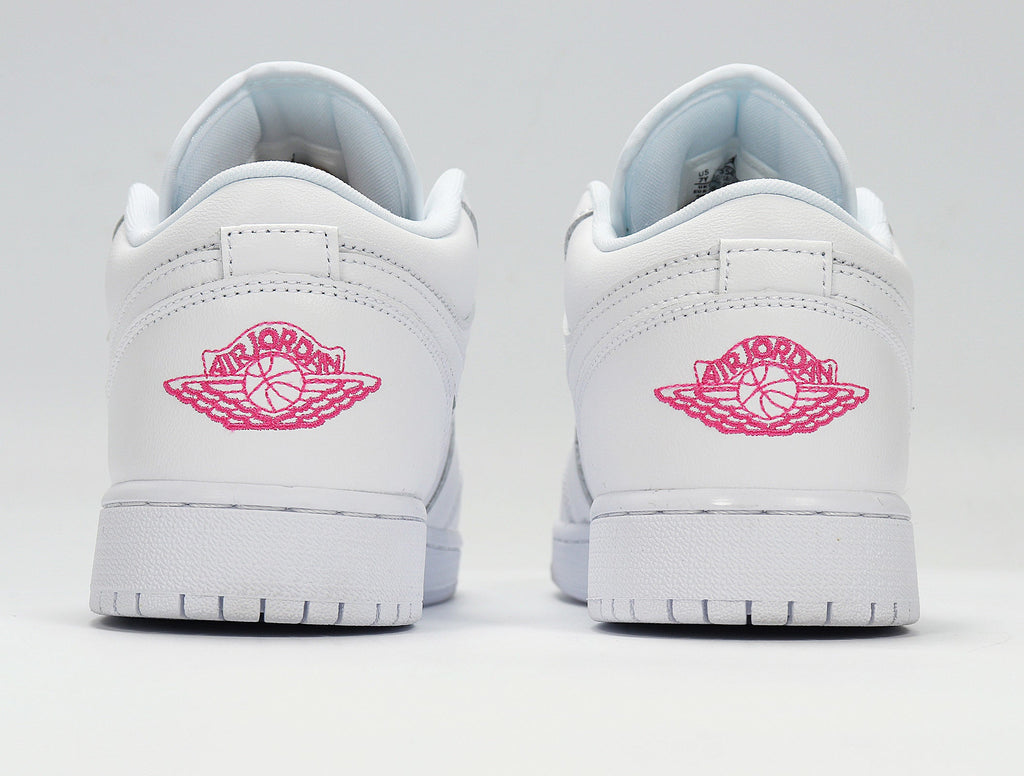 Air Jordan 1 Low White Pink Sneakers 554723-102 - product image from the listing.