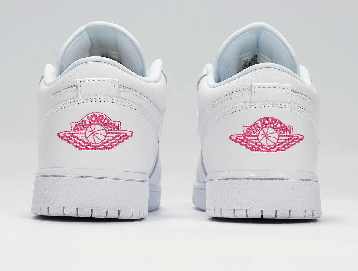 Air Jordan 1 Low White Pink Sneakers 554723-102 - product image from the listing.