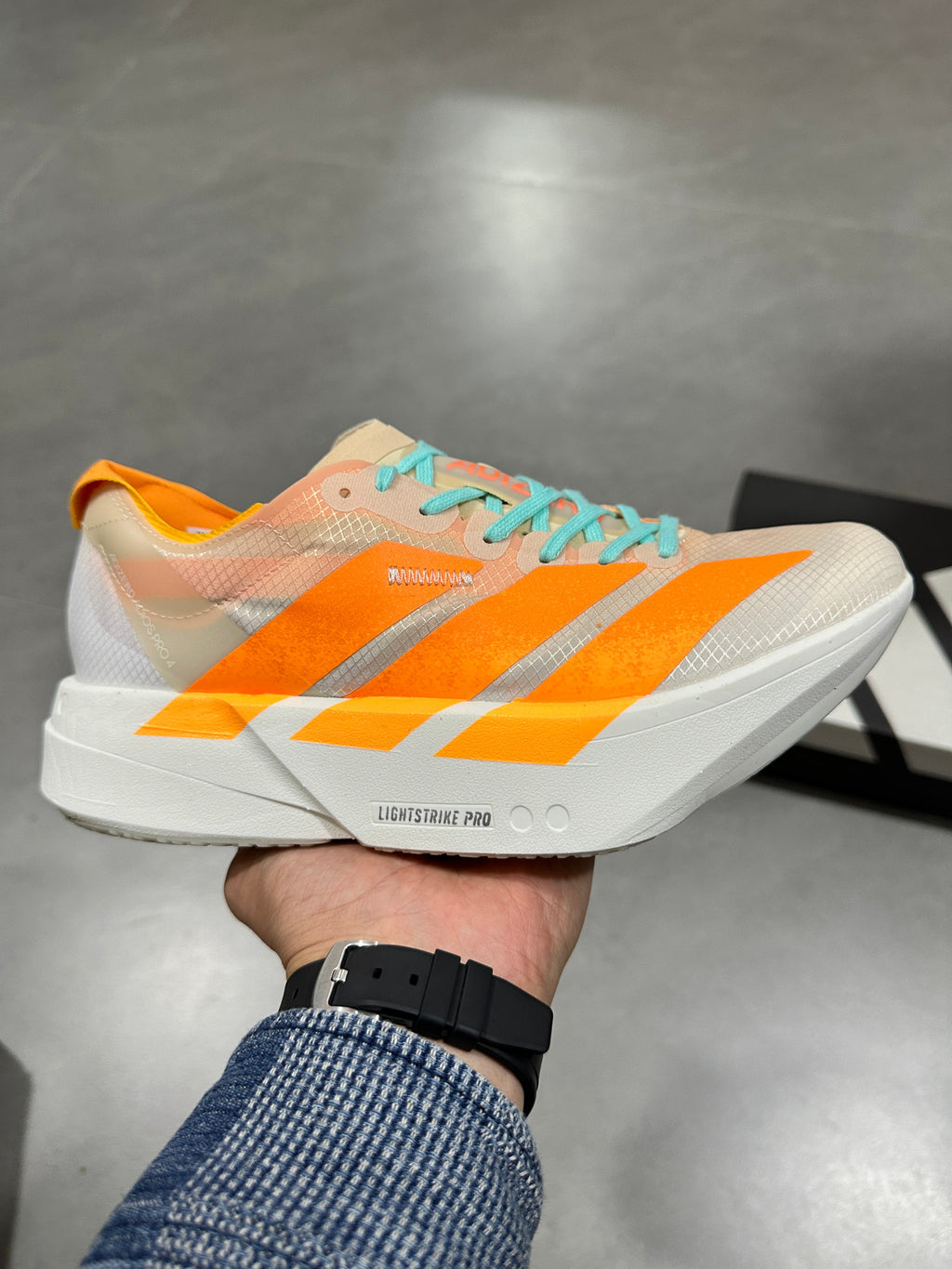 Nike Lightstrike Pro Running Shoes in White Orange Turquoise - product image from the listing.