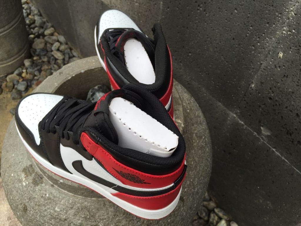 Jordan 1 High Sneakers in Black White Red - product image from the listing.