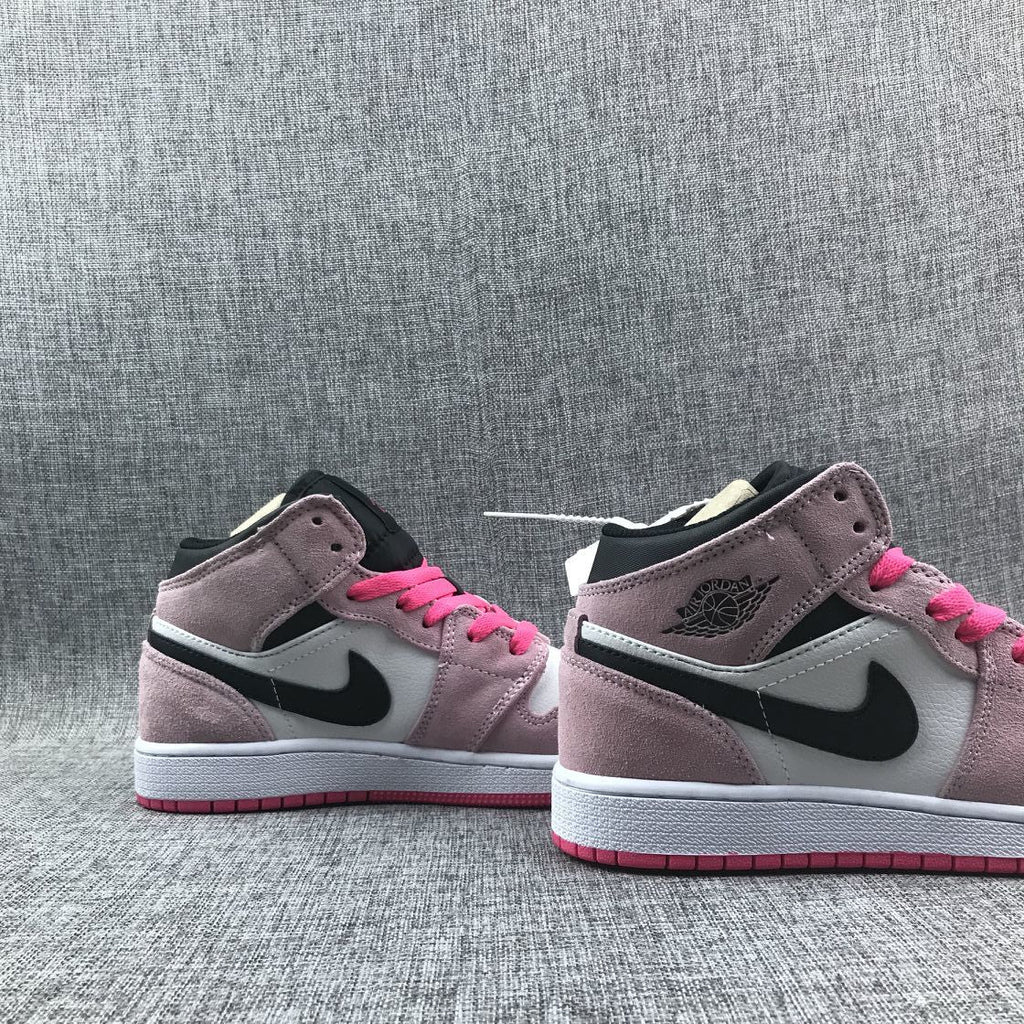 Jordan 1 Mid Sneakers in Pink White Black 852542-801 - product image from the listing.