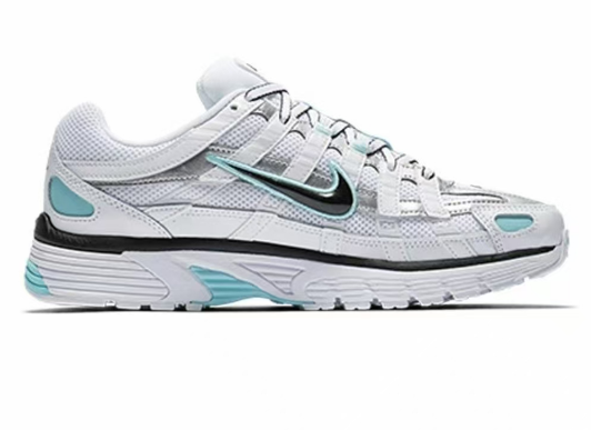 Nike White and Aqua Mesh Sneakers for Running - product image from the listing.