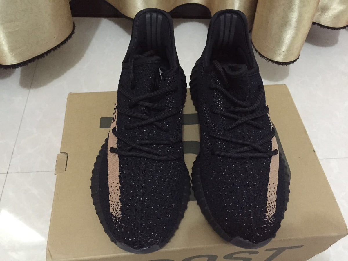Black and Beige Yeezy 350 V2 Knit Sneakers - product image from the listing.