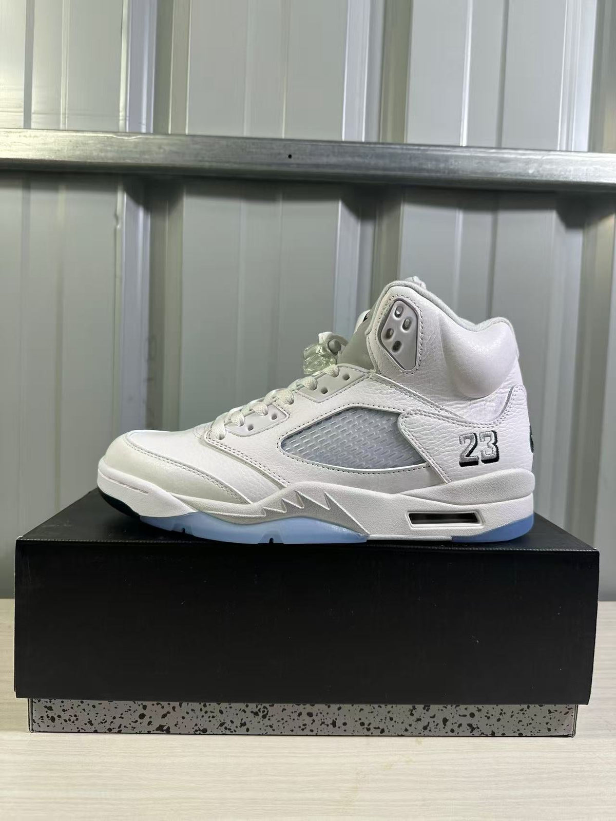 Air Jordan 5 Sneakers in White Silver HQ7978-103 - product image from the listing.