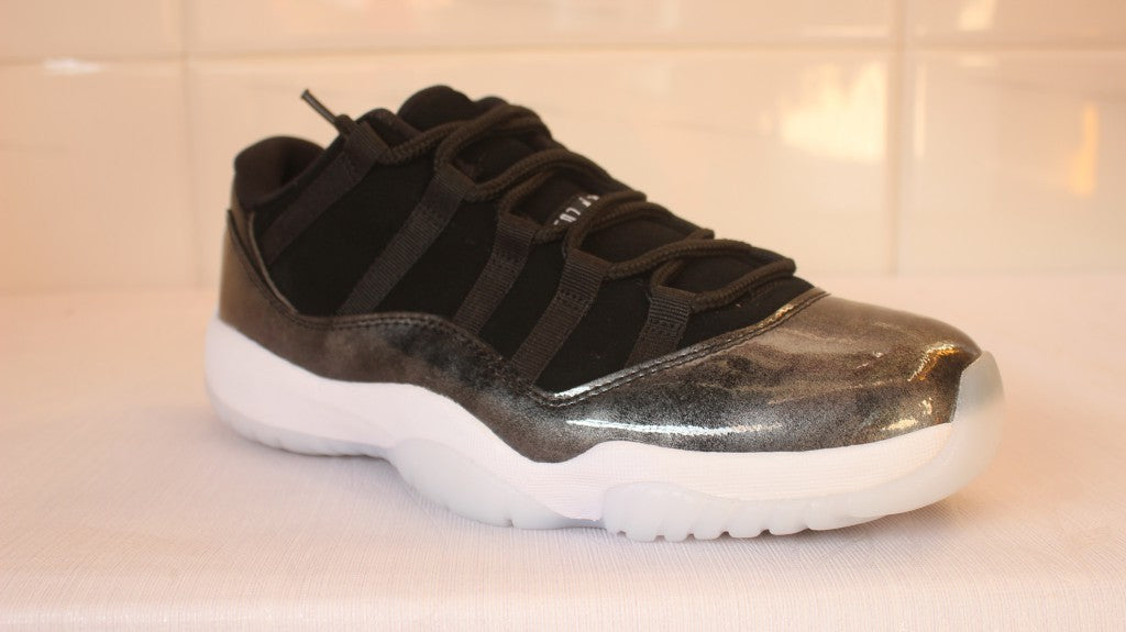 Air Jordan 11 Low Barons Black Sneakers - product image from the listing.