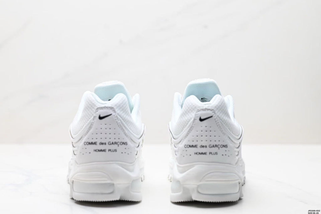 Nike Air Max Plus Comme des Garçons Sneakers in White - product image from the listing.