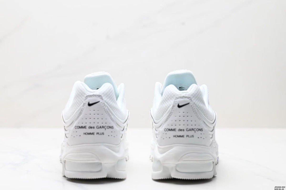 Nike Air Max Plus Comme des Garçons Sneakers in White - product image from the listing.
