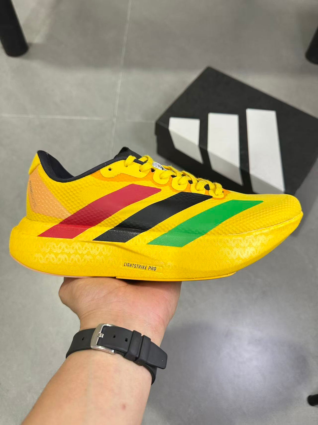 adidas Lightstrike Pro Running Shoes in Yellow KJ3625 - product image from the listing.