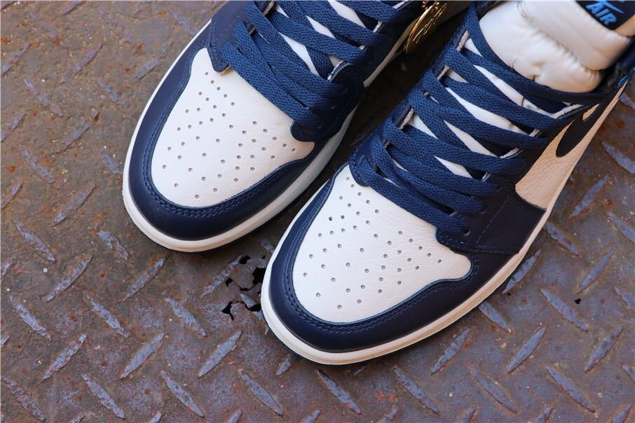 Air Jordan 1 Retro High OG Sneakers in Blue and White - product image from the listing.