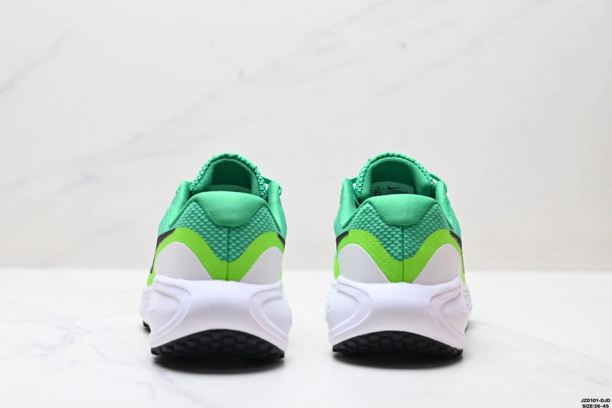 Teal and Lime Nike Revolution 8 Running Shoes - product image from the listing.