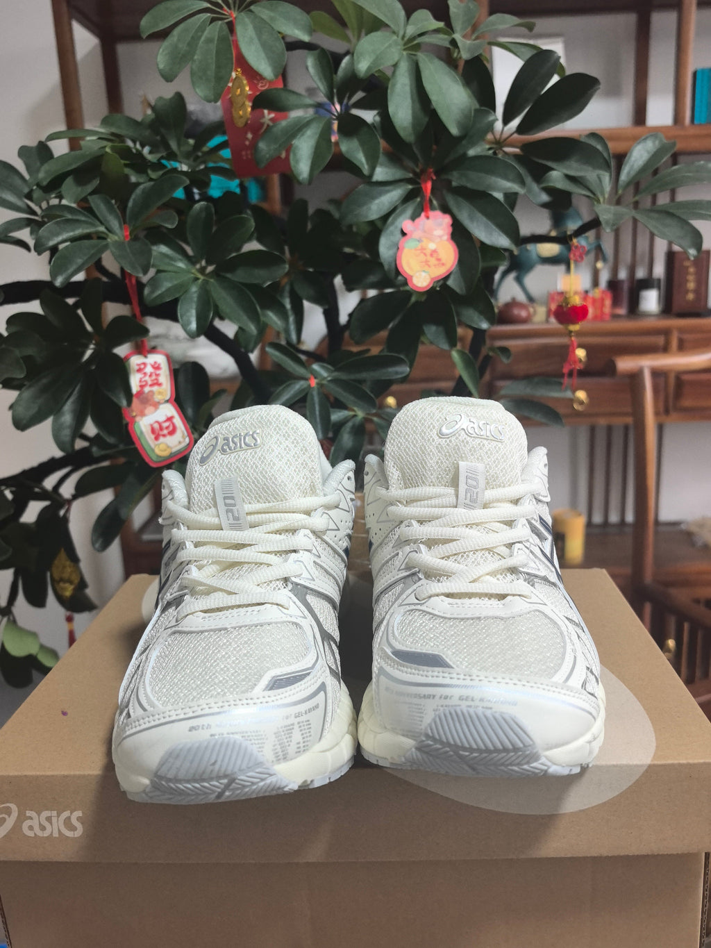 ASICS GEL-NANDI 9 Sneakers in Cream and Blue - product image from the listing.