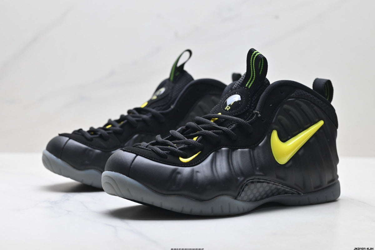 Nike Air Foamposite One Black Neon Sneakers in Yellow - product image from the listing.