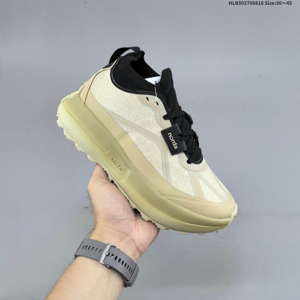 Cream and Black Norda 055 Trail Running Shoes - product image from the listing.