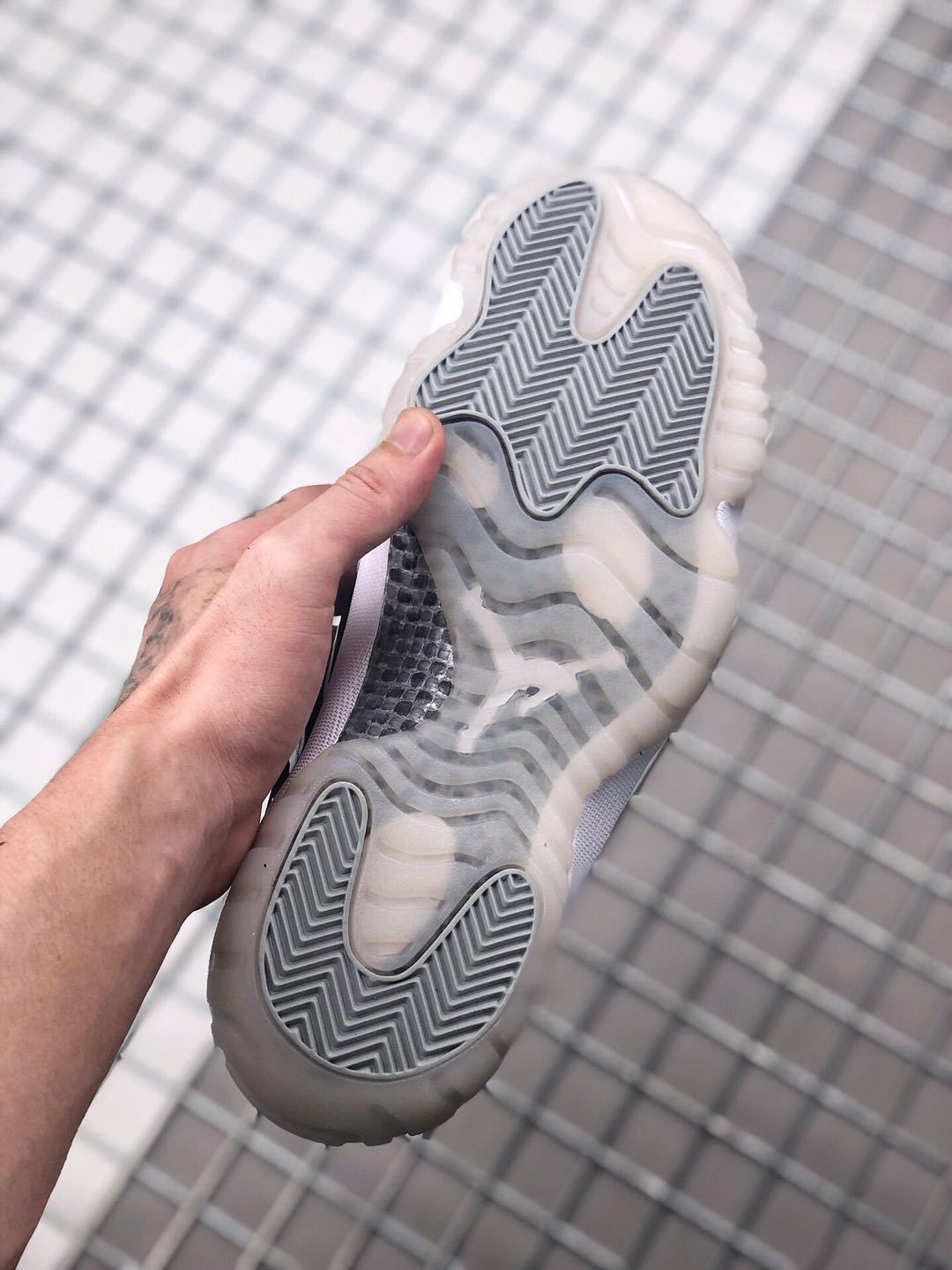 Air Jordan 11 Silver Eyelets Black White Sneakers - product image from the listing.