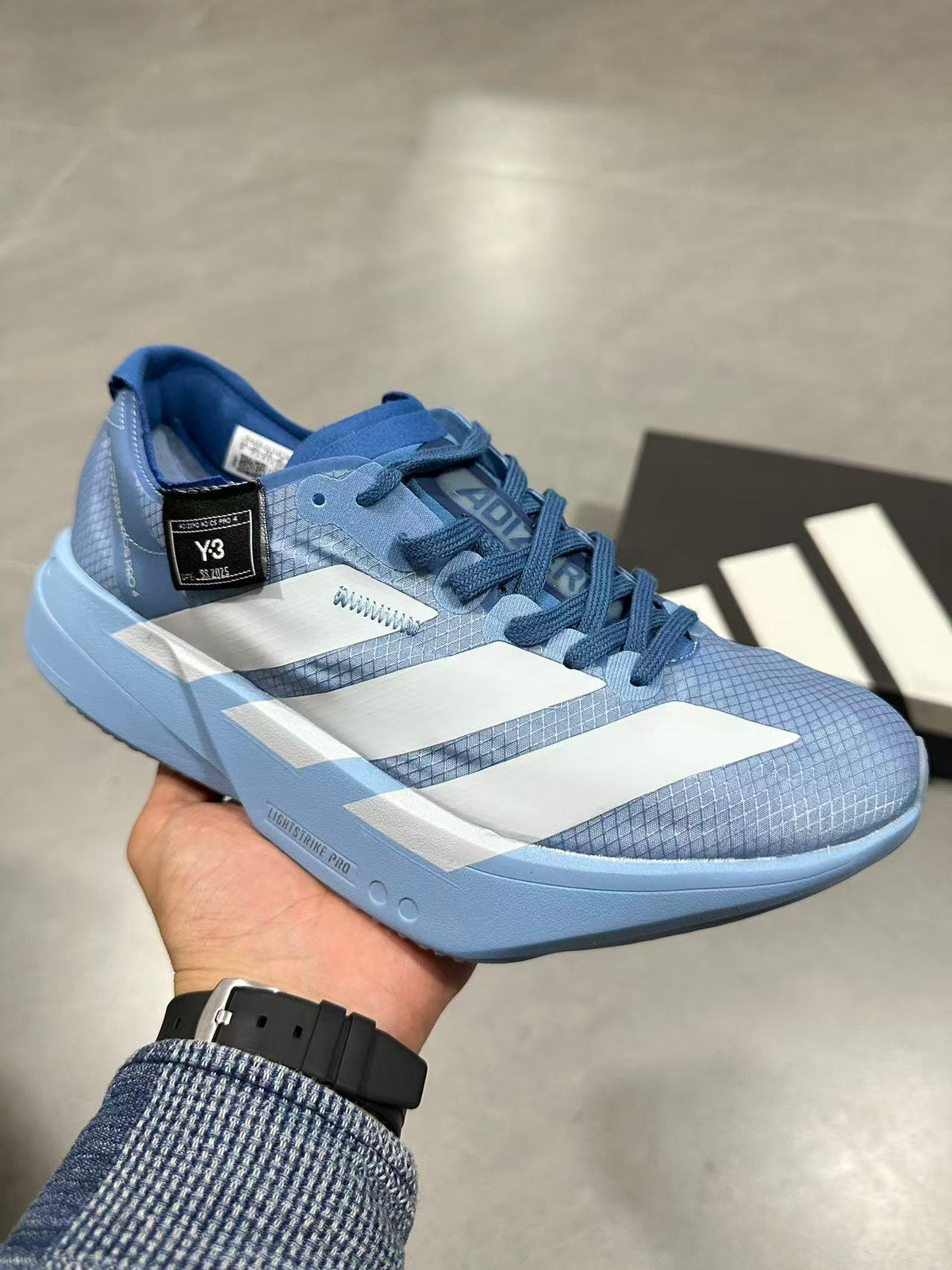 Blue Adidas Lightstrike Pro Running Shoes - product image from the listing.