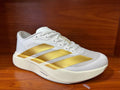 Adidas Adizero Running Shoes in White and Gold - product image from the listing.