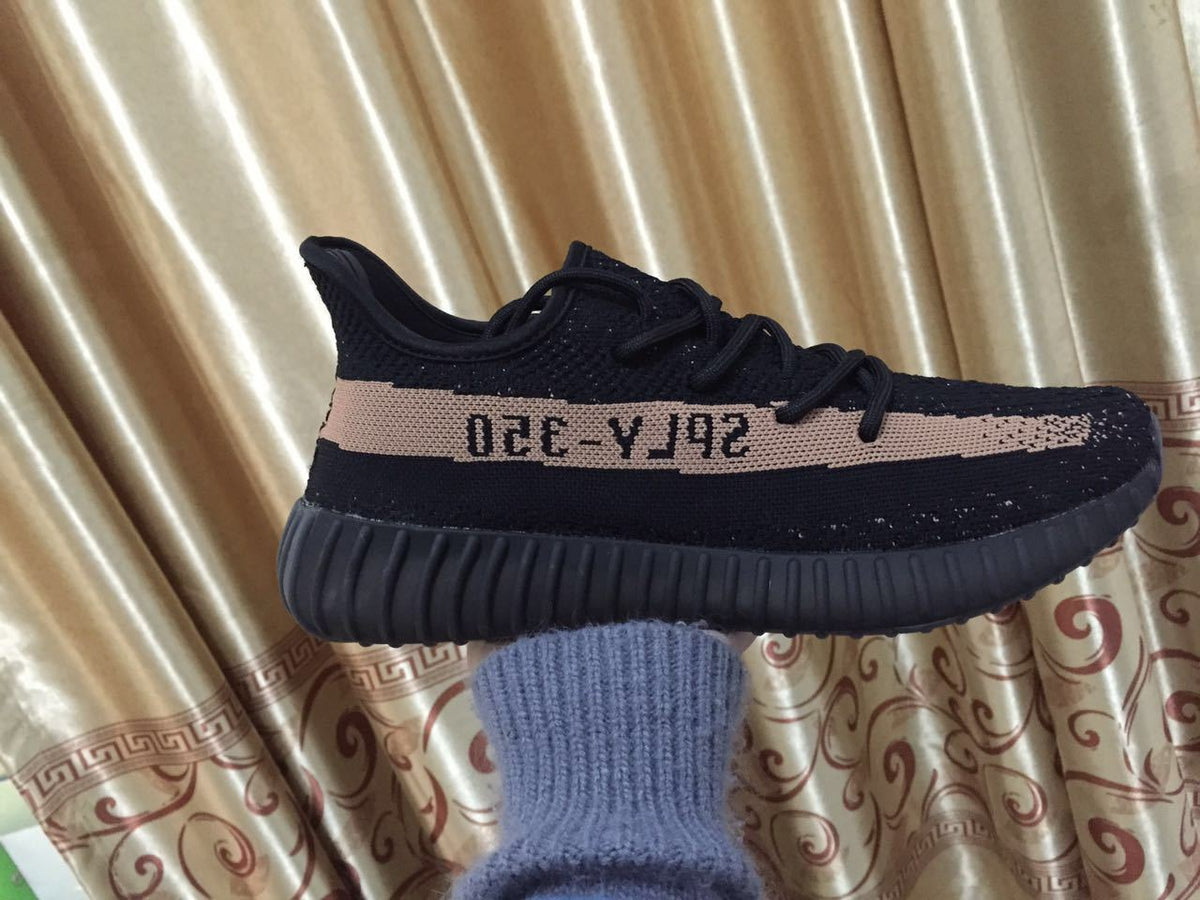 Black and Beige Yeezy 350 V2 Knit Sneakers - product image from the listing.