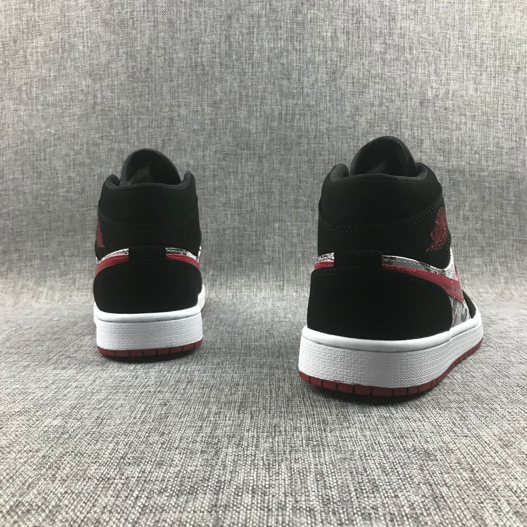 Air Jordan 1 Mid Sneakers in Black Red 852542-061 - product image from the listing.