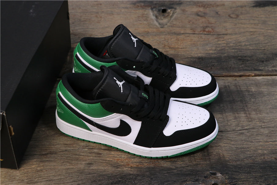 Jordan 1 Low Sneakers in Black Green 553558-113 - product image from the listing.