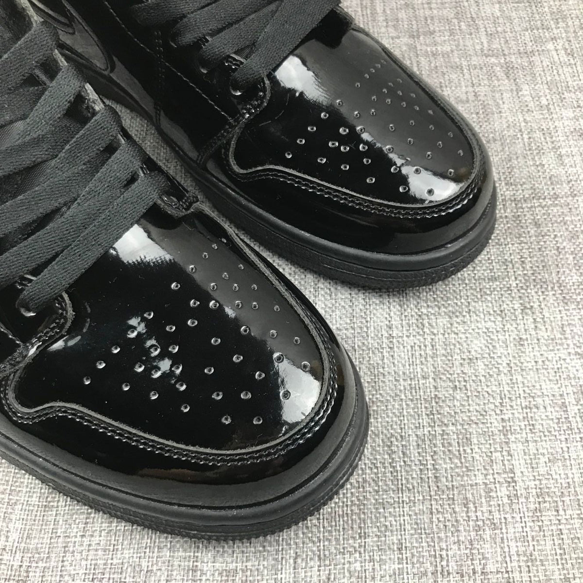 Black Patent Sneakers - Air Jordan 1 Mid BQ6472-002 - product image from the listing.