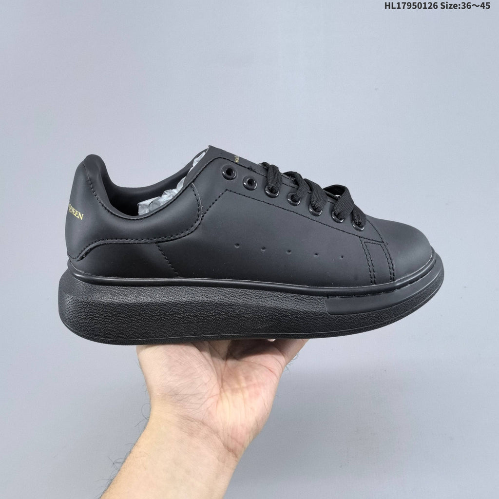 Alexander McQueen Low-Cut Sneakers in Black with Thick Sole - product image from the listing.