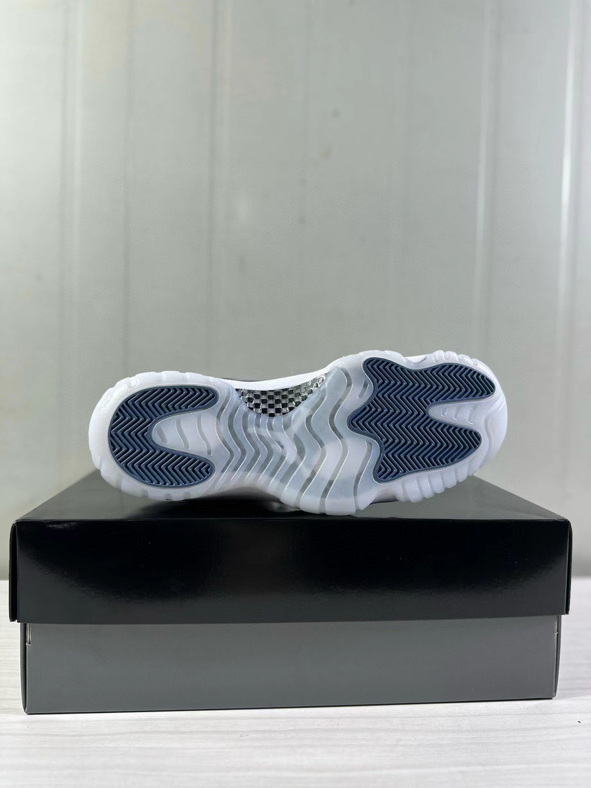 Air Jordan 11 Low Diffused Blue Sneakers FV5104-104 - product image from the listing.