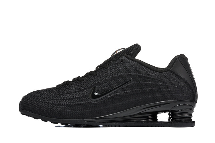 Nike Shox R4 Sneakers in Black - product image from the listing.