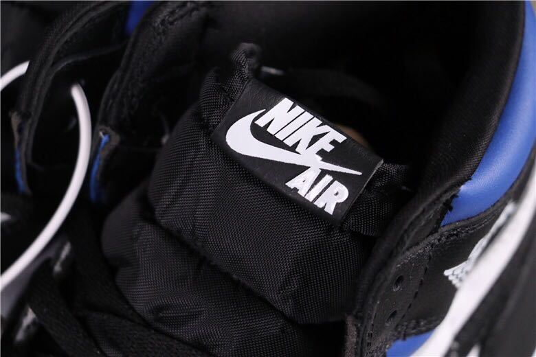 Air Jordan 1 Game Royal High-Top Sneakers in Black Blue White - product image from the listing.