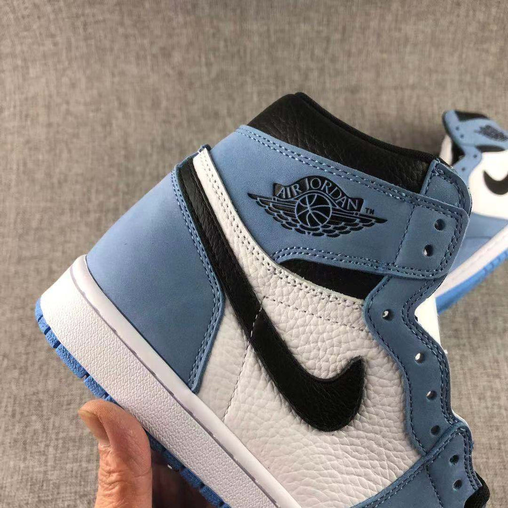 Air Jordan 1 High OG University Blue Sneakers - product image from the listing.