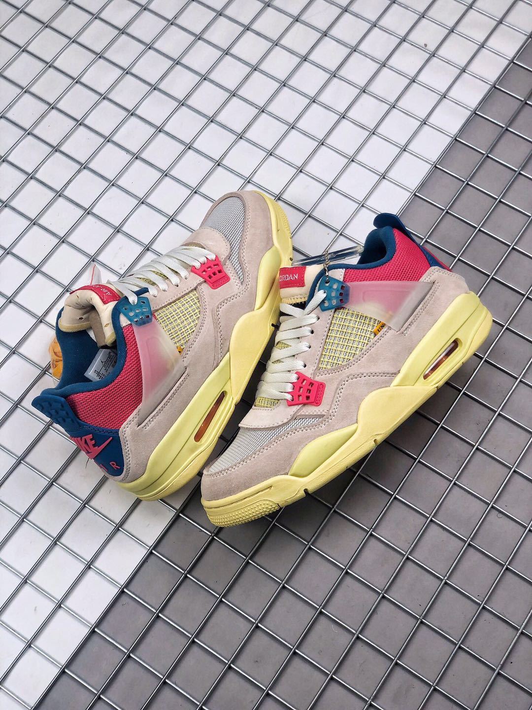 Union x Air Jordan 4 Sneakers in Pink Beige Navy Yellow - product image from the listing.