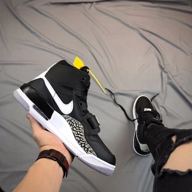 Air Jordan Legacy 312 High-Top Sneakers in Black and White - product image from the listing.