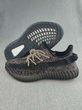 Black and Cream Yeezy 350 V2 Knit Sneakers - product image from the listing.
