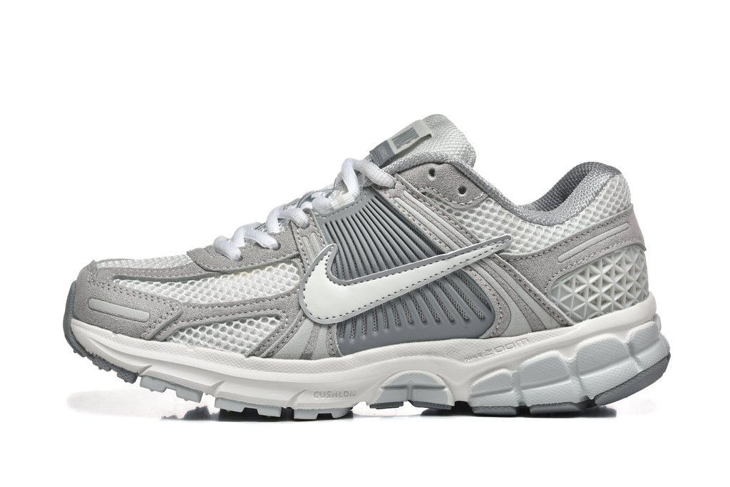 Grey and White Nike Vomero 5 Sneakers - product image from the listing.