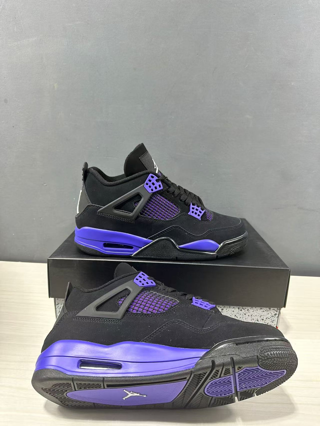 Air Jordan 4 Retro Black Blue Sneakers CT8527-018 - product image from the listing.