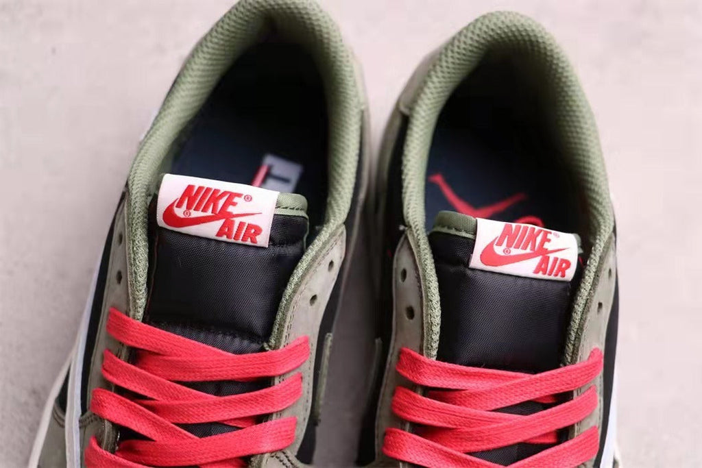 Jordan 1 Low Travis Scott Sneakers in Black Grey White CQ4277-008 - product image from the listing.
