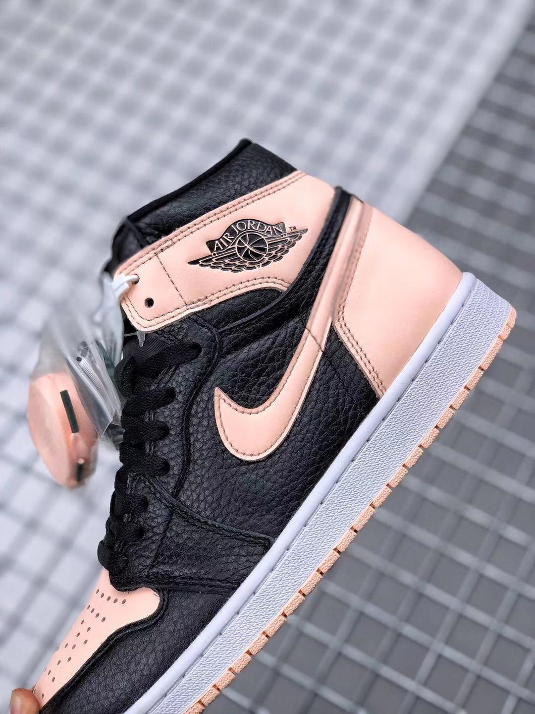 Air Jordan 1 High OG Crimson Tint Sneakers in Black Pink - product image from the listing.