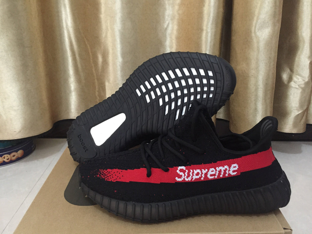 Yeezy 350 V2 Sneakers in Black and Red Knit - product image from the listing.
