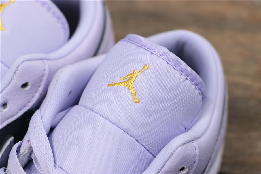 Air Jordan 1 Low GS Oxygen Sneakers in Purple 554723-505 - product image from the listing.