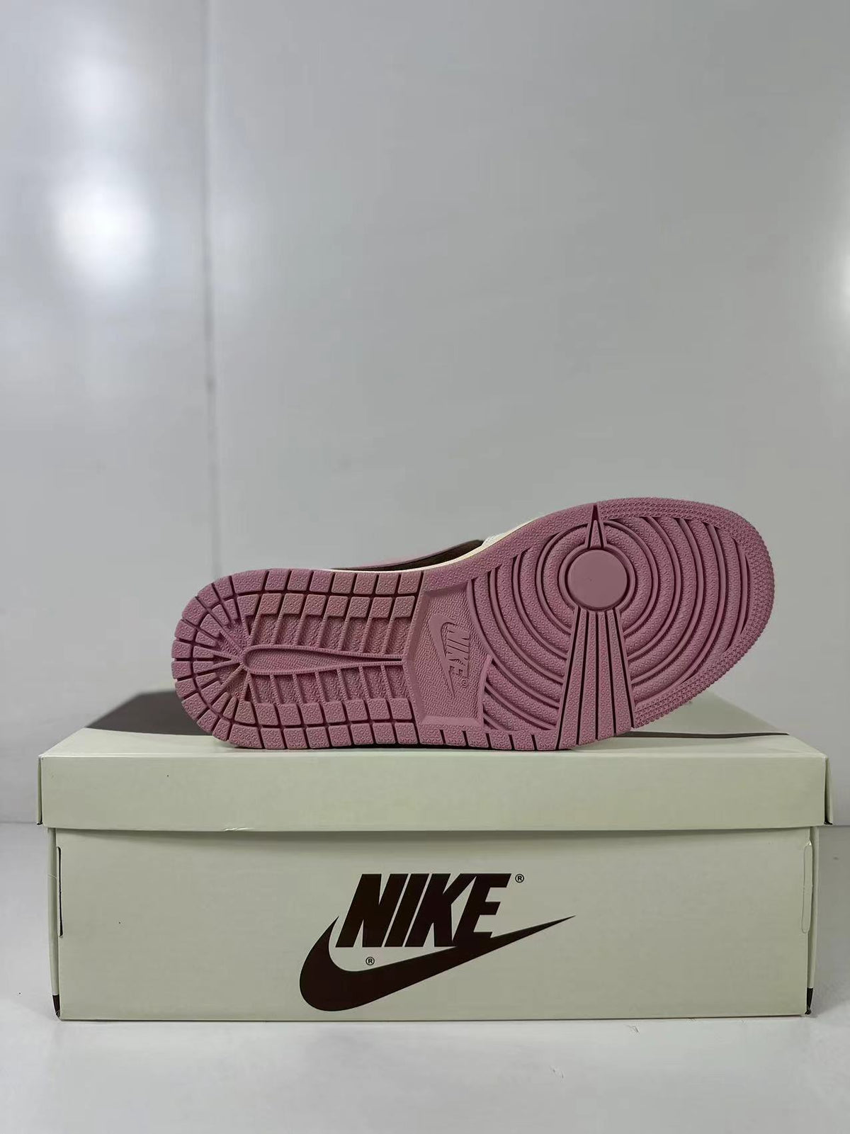 Jordan 1 Low Travis Scott in Brown White Pink DZ4137-206 - product image from the listing.