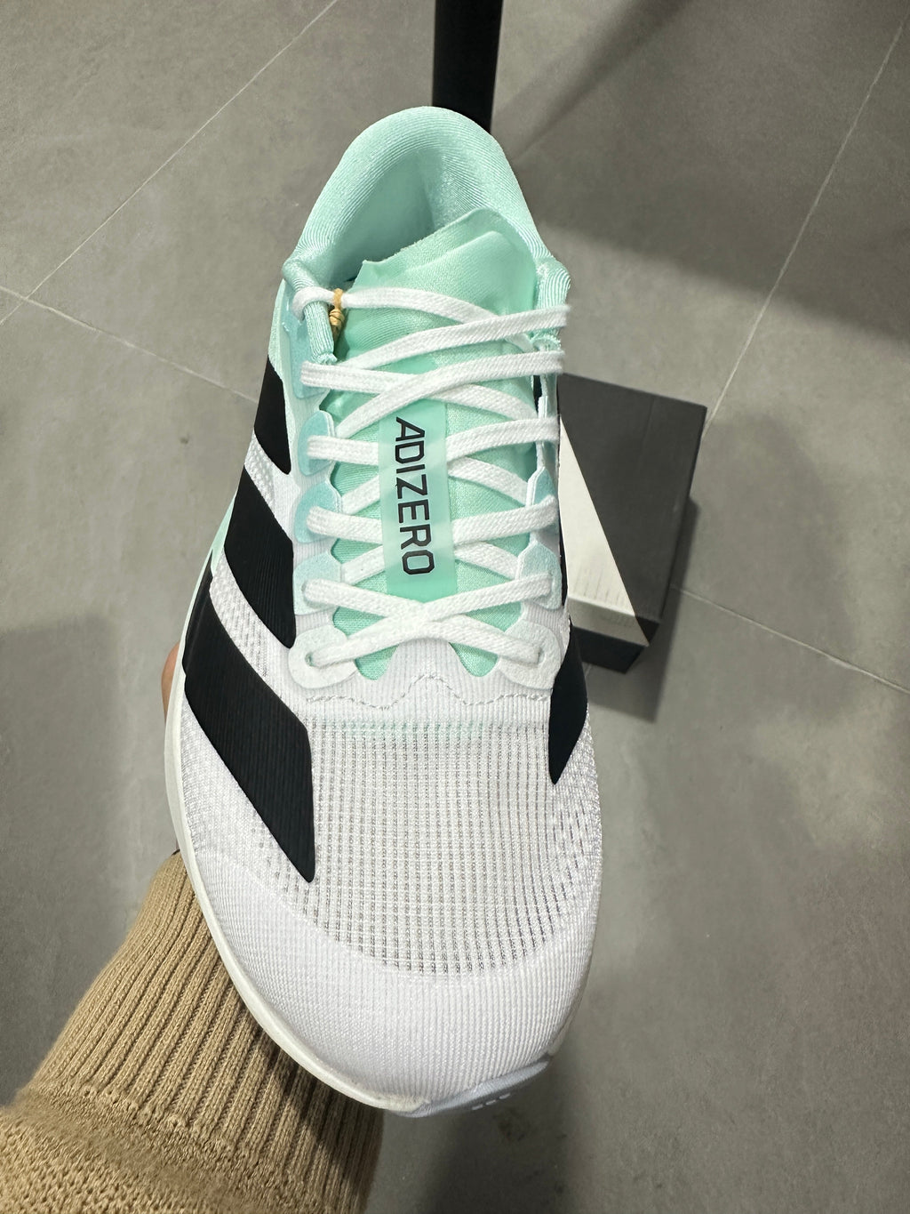 White and Mint adidas Adizero Lightweight Running Shoes - product image from the listing.