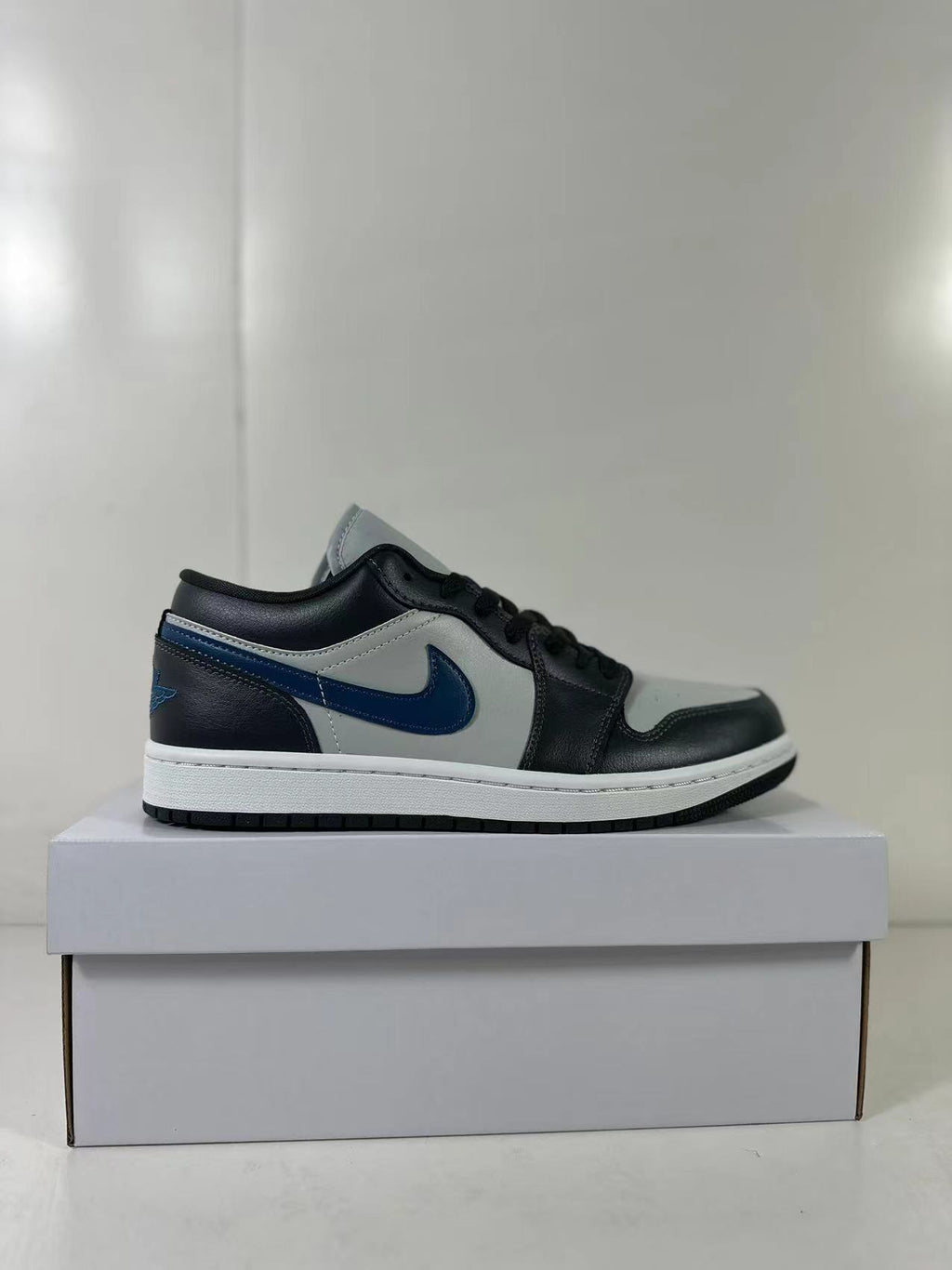 Air Jordan 1 Low Black Grey Blue DC0774-040 - product image from the listing.