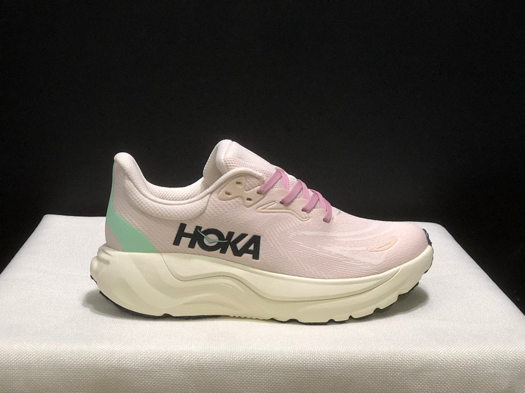 Women's HOKA Arahi 8 Running Shoes, Pink and Mint - product image from the listing.